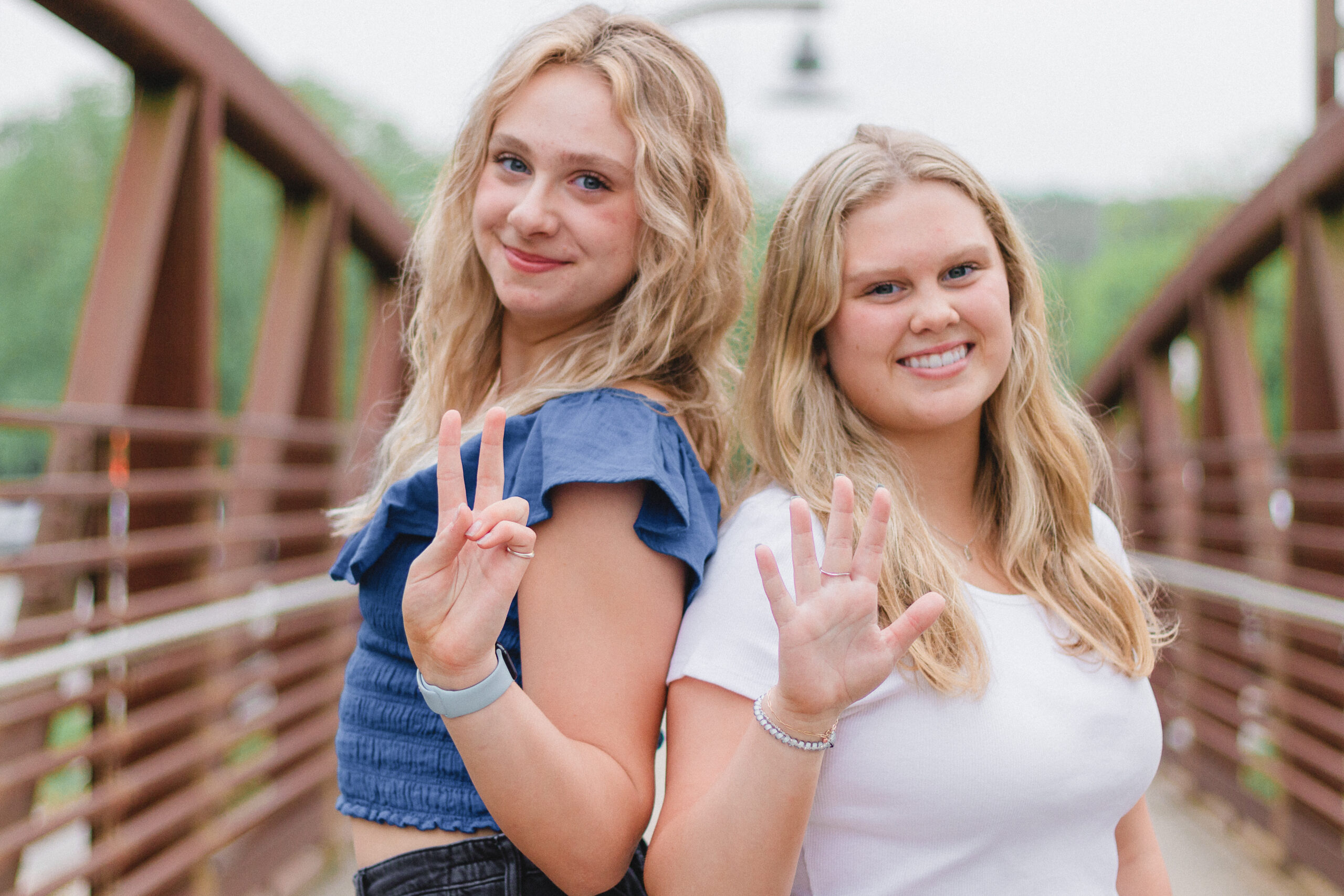 Best friends pose during Senior Pictures on a Bridge at Kerr Park in ChesCo, Pa