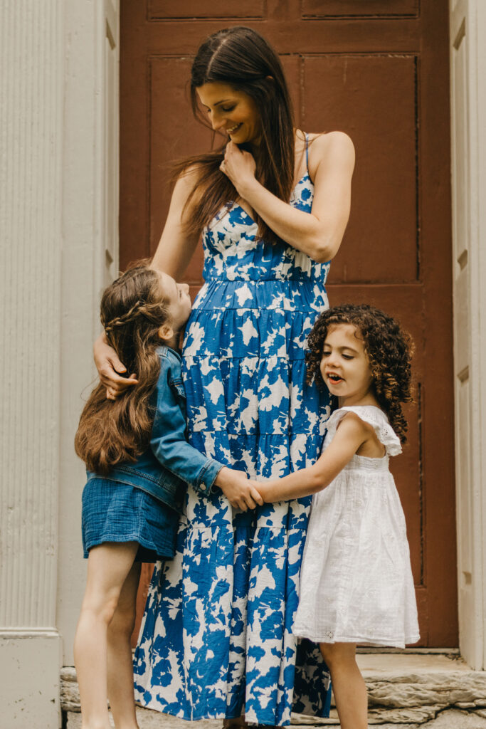 mother smiles at her children at photography fundraiser for General Wayne